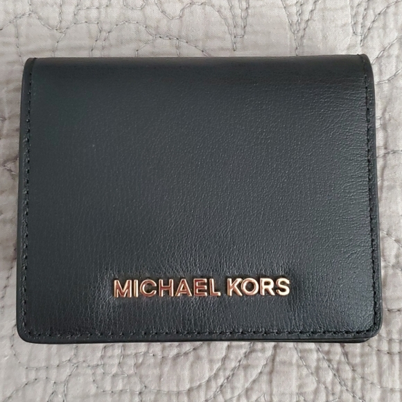 Michael Kors Handbags - Michael Kors Jet Set Travel wallet NWOT
